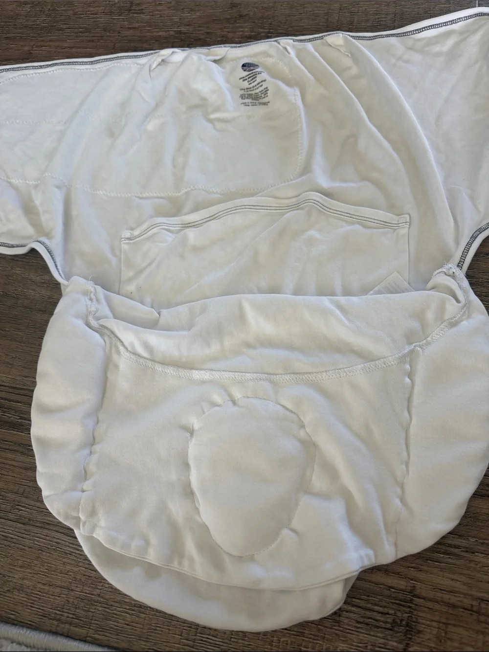 Nested Bean White & Gray Baby Swaddle with Embroidered Face